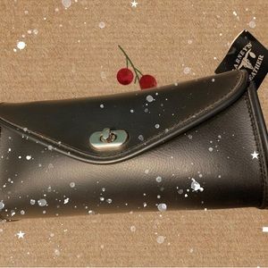 Barney's leather biker tool roll pouch